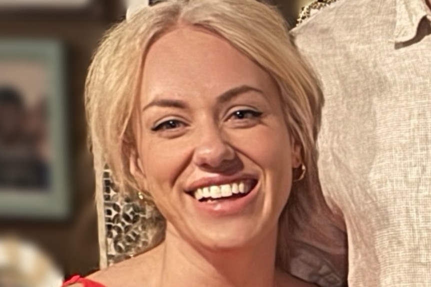 woman with blonde hair smiling
