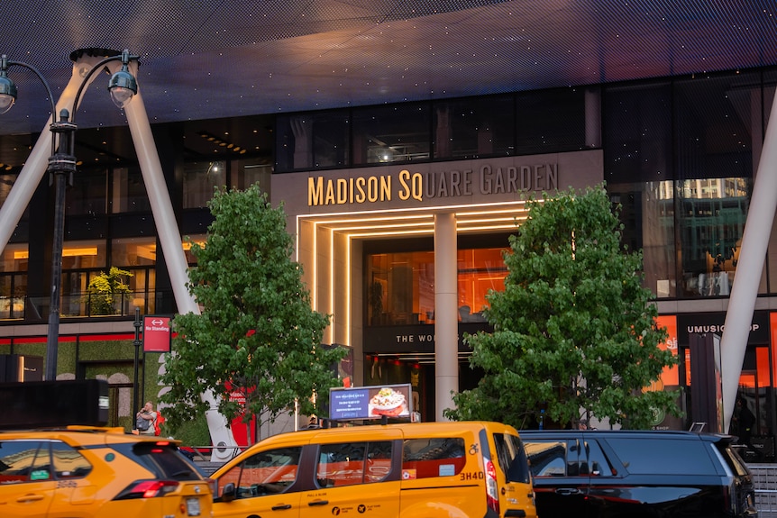 Taxi cabs and cars seen outside of Madison Square Garden.