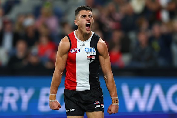Hugo Garcia of the Saints celebrates kicking a goal.