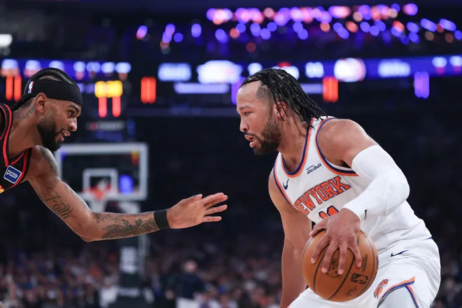 Apr 18, 2026; New York, New York, USA; New York Knicks guard Jalen Brunson (11) is guarded by Atlanta Hawks guard Nickeil Alexander-Walker (7) during the first quarter of the 2026 NBA Playoffs at Madison Square Garden. Mandatory Credit: Vincent Carchietta-Imagn Images