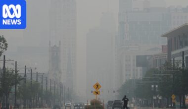 Smoke from Canada wildfires crosses into US prompting warnings to stay indoors