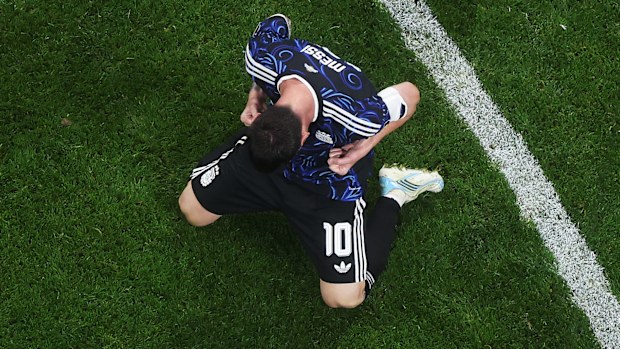 Messi celebrates alone after a semi final victory