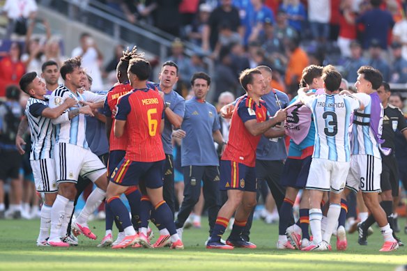 Argentina and Spain players clash after full-time in the World Cup final.