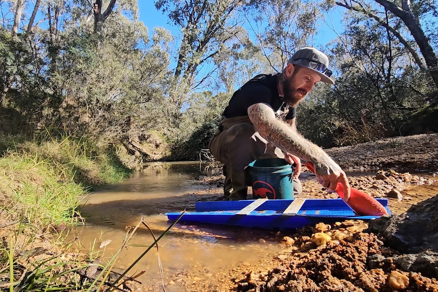 Chris prospecting in a riverbed.
