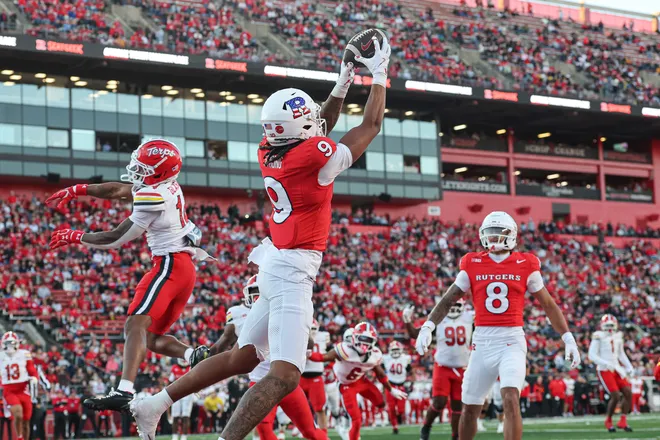 Nov 8, 2025; Piscataway, New Jersey, USA; Rutgers Scarlet Knights wide receiver Ian Strong (9) catches the ball a touchdown pass during the first half against the Maryland Terrapins at SHI Stadium. Mandatory Credit: Vincent Carchietta-Imagn Images