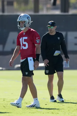 Jun 9, 2026; Henderson, NV, USA; Las Vegas Raiders quarterback Fernando Mendoza (15) and coach Klint Kubiak during minicamp at Intermountain Health Performance Center. Mandatory Credit: Kirby Lee-Imagn Images