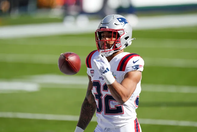 New England Patriots running back Treveyon Henderson (32) warms up before the game against the Seattle Seahawks in Super Bowl LX at Levi's Stadium.