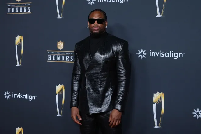 Derrick Henry poses on the NFL Honors Red Carpet before Super Bowl LX at Palace of Fine Arts.