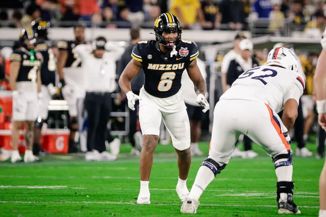 Dec 27, 2025; Jacksonville, FL, USA; Missouri Tigers defensive end Damon Wilson II (8) looks on before a play against the Virginia Cavaliers during the second quarter at EverBank Stadium. Mandatory Credit: Travis Register-Imagn Images