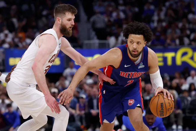 May 17, 2026; Detroit, Michigan, USA; Detroit Pistons guard Cade Cunningham (2) dribbles against Cleveland Cavaliers forward/center Dean Wade (32) in the second half during game seven of the second round of the 2026 NBA Playoffs at Little Caesars Arena. Mandatory Credit: Rick Osentoski-Imagn Images