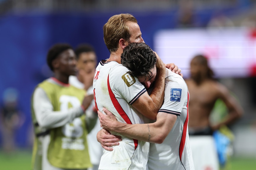 Harry Kane and Declan Rice hug