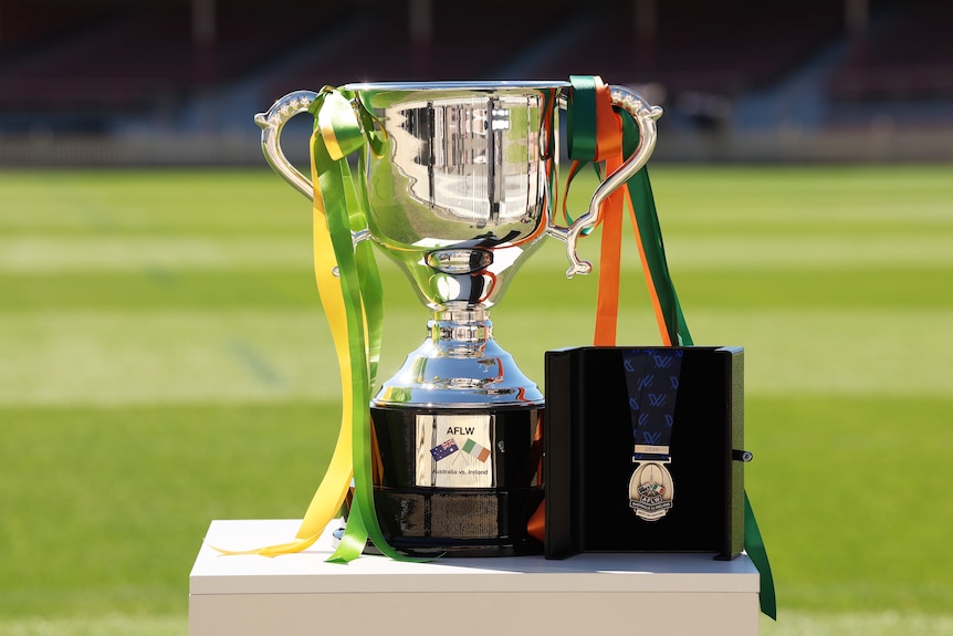 The Australia v Ireland Cup and Best on Ground medal.