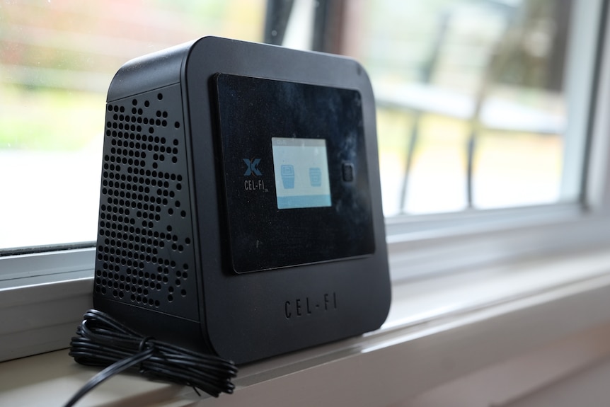 cell-fi monitor sits on a windowsill