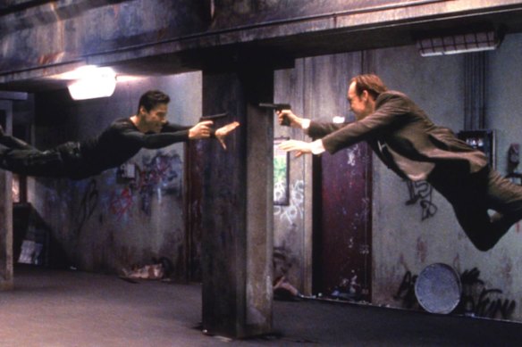 Production has been suspended: Keanu Reeves and Hugo Weaving in science fiction film The Matrix.