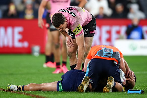 Class act: Nathan Cleary checks in on Tallyn Da Silva.