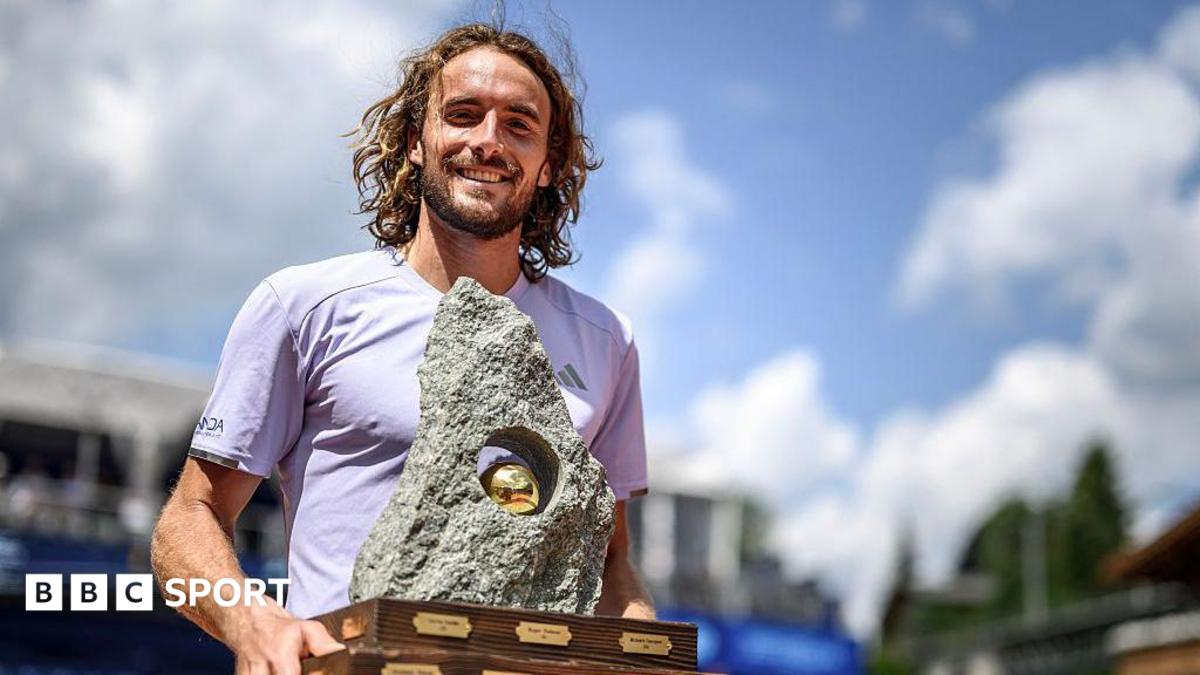Stefanos Tsitsipas holds the Swiss Open trophy