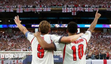 Jude Bellingham and Harry Kane of England salute the fans after the 2-1 victory over Norway
