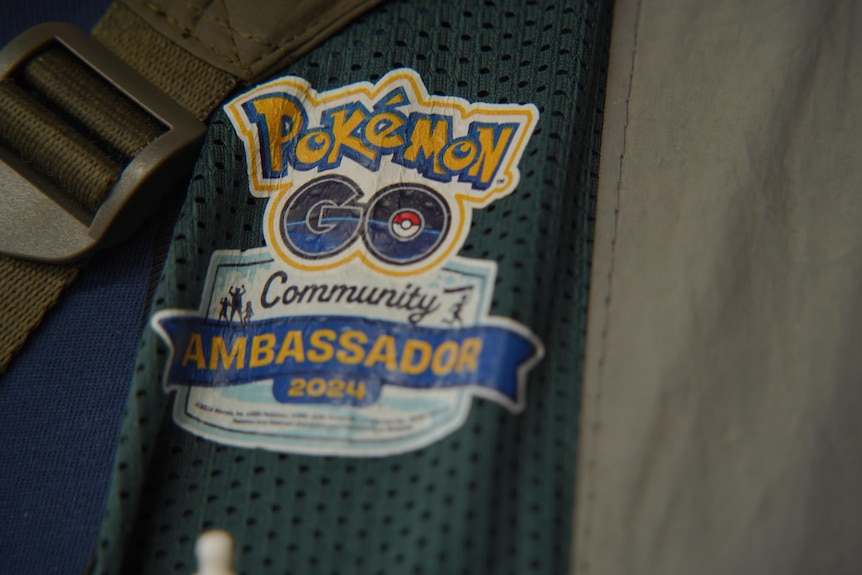 A vest with the emblem reading Pokemon GO Community Ambassador 2024