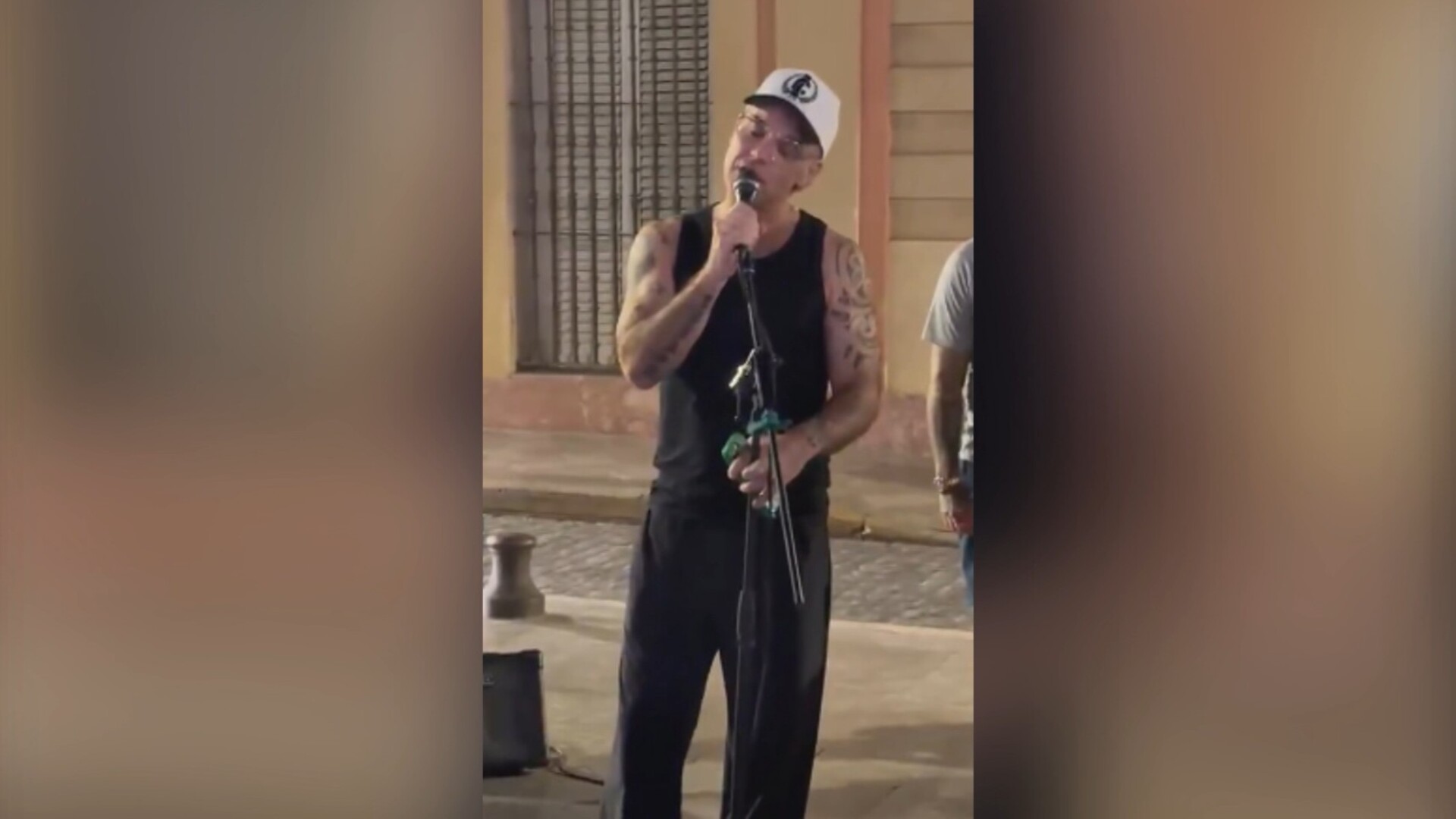 Robbie Williams spotted busking in the streets of Spain