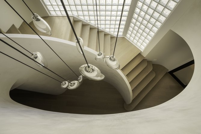 Entirely custom-built, it is now a sculptural feature that anchors the home.