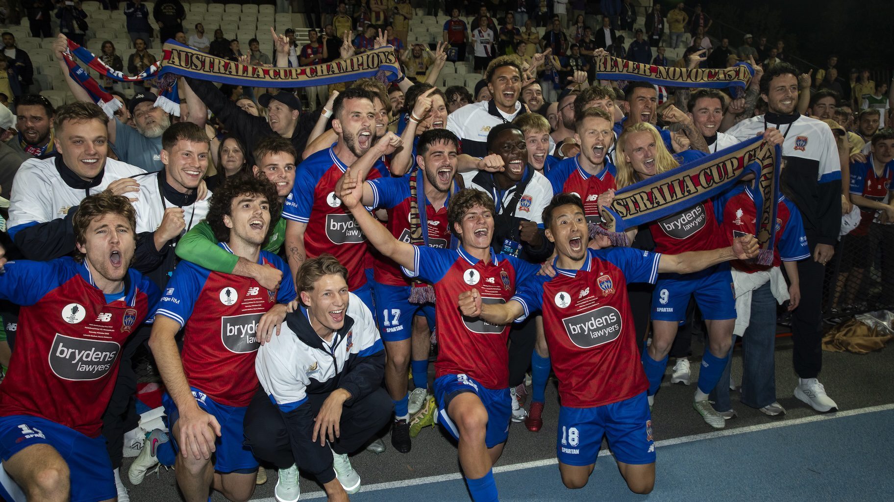 Newcastle Jets with their fans in Melbourne.