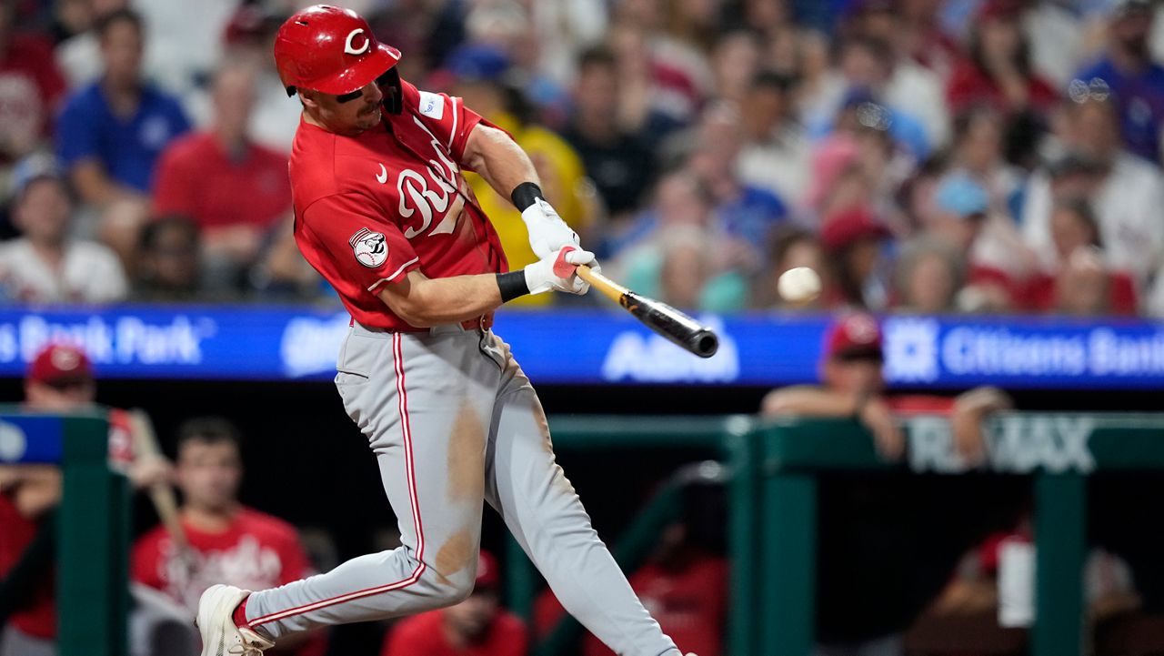 Cincinnati Reds' Spencer Steer hits a run-scoring double against Philadelphia Phillies pitcher José Alvarado during the eighth inning of a baseball game Monday, May 18, 2026, in Philadelphia. (AP Photo/Matt Slocum)
