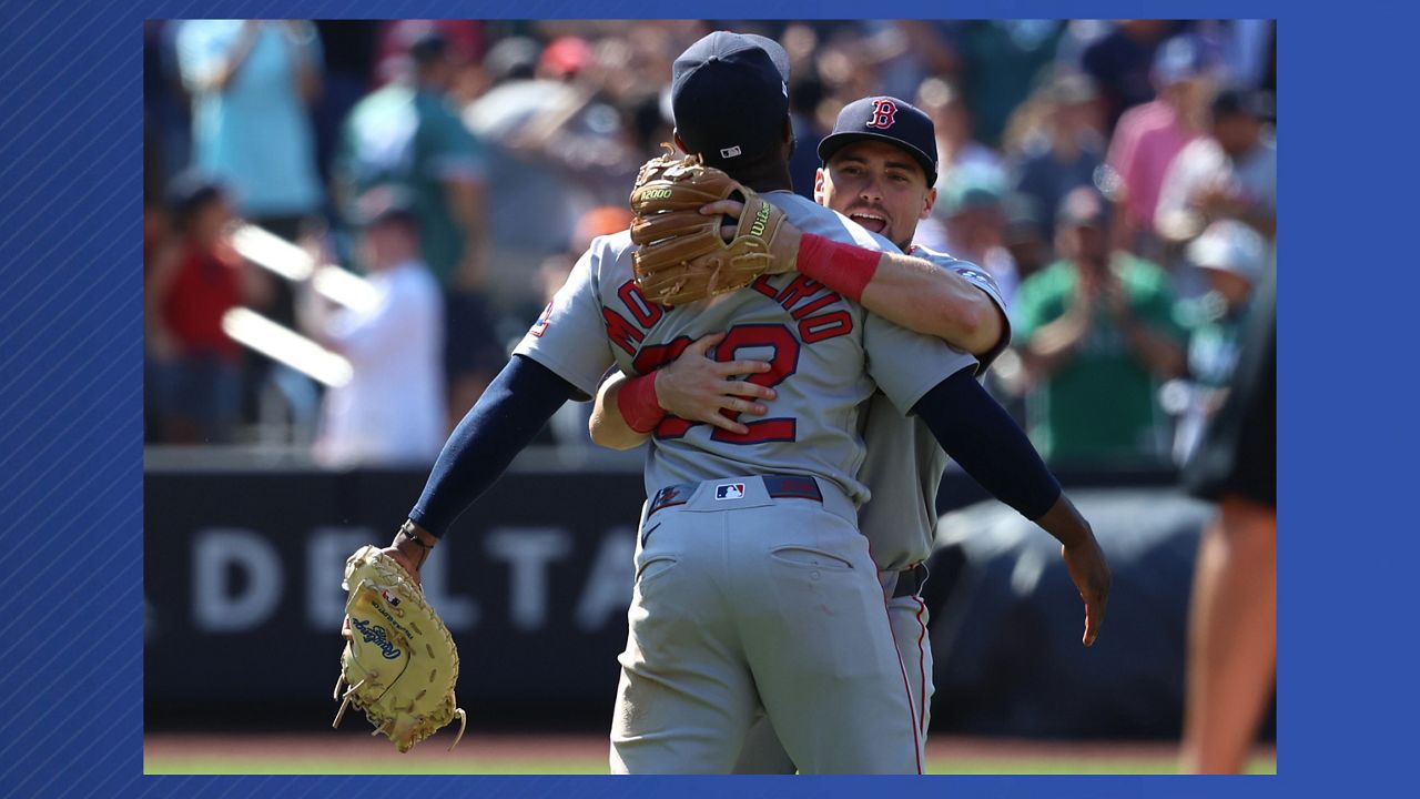 Boston Red Sox's Andruw Monasterio, left,  and Caleb Durbin, right, react after winning a baseball game against the New York Mets, Sunday, July 12, 2026, in New York. (AP Photo/Pamela Smith)