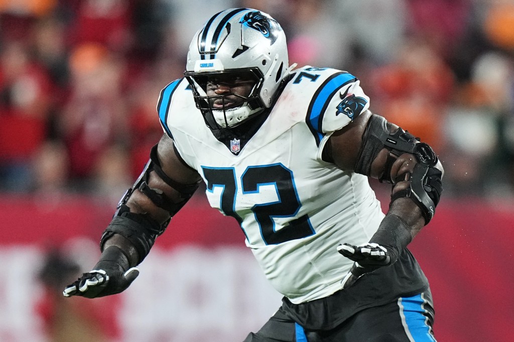 Carolina Panthers offensive tackle Taylor Moton (72) run blocks during an NFL football game against the Tampa Bay Buccaneers on Saturday, Jan 3, 2026, in Tampa, Fla.