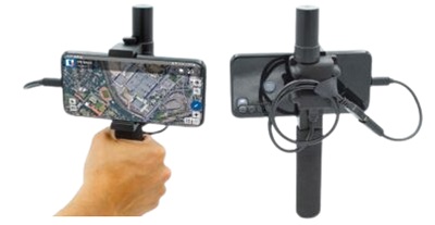 A hand holding a pole on which is attached a mobile device equipped with a GPS receiver