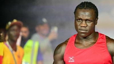 Uganda's Aziz Abdul arrives for his bout. (AFP)