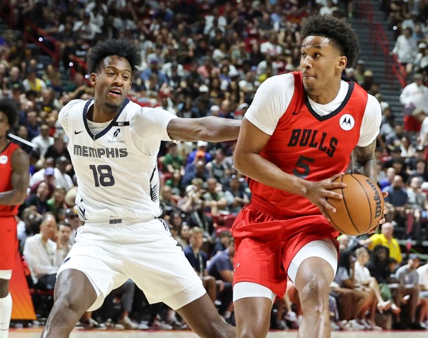 Bulls guard Dailyn Swain (5) drives against the Grizzlies' Olivier-Maxence Prosper in the first half of a summer league game on July 10, 2026 in Las Vegas. (Ethan Miller/Getty)