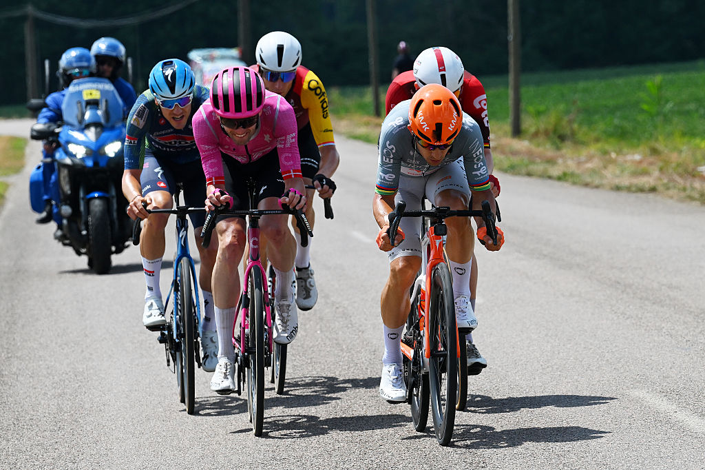 Breakaway effort by (L-R) Louis Vervaecke of Soudal Quick-Step, Kasper Asgreen of EF Education - EasyPost and Michal Kwiatkowski of Netcompany Ineos