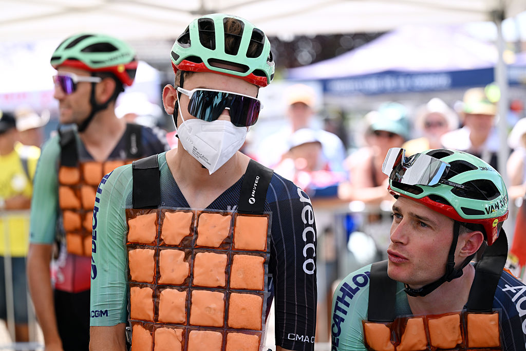 Paul Seixas of France and Decathlon CMA CGM Team (L) wearing an ice vest and a mask prior to the 113th Tour de France 2026, Stage 9 a 155.5km stage from Malemort to Ussel