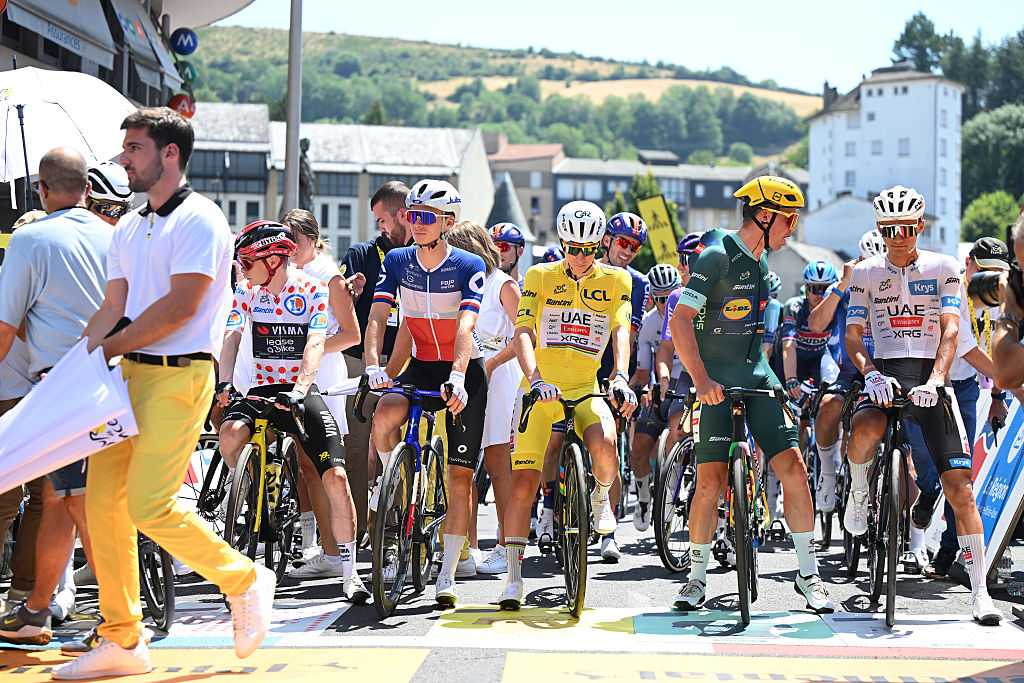 AURILLAC, FRANCE - JULY 14: (L-R) Jonas Vingegaard of Denmark and Team Visma | Lease a Bike - Polka dot Mountain Jersey, Romain Gregoire of France and Team Groupama - FDJ United, Tadej Pogacar of Slovenia and UAE Team Emirates - XRG - Yellow Leader Jersey, Mads Pedersen of Denmark and Team Lidl - Trek - Green Sprint Jersey and Isaac Del Toro of Mexico and UAE Team Emirates - XRG - White best Young Rider Jersey prior to 113th Tour de France 2026, Stage 10 a 166.6km stage from Aurillac to Le Lioran 1240m / #UCIWT / on July 14, 2026 in Aurillac, France. (Photo by Dario Belingheri/Getty Images)