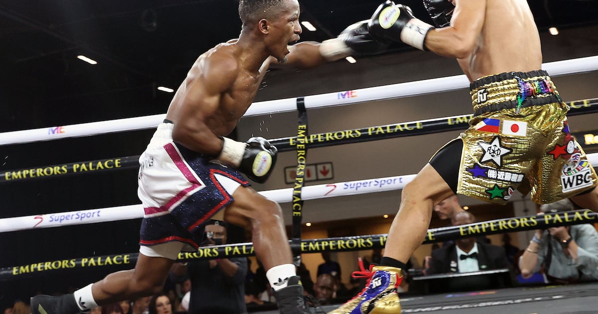 Kuse defends world title in historic Japanese event