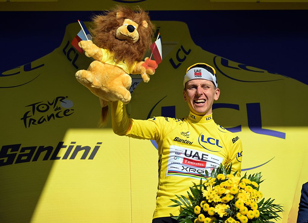 Slovenian Tadej Pogacar of UAE Team Emirates-XRG and pictured on the podium after winning the stage 10 of the 2026 Tour de France cycling race, a stage of 167km from Aurillac to Le Lioran, on Tuesday 14 July 2026. The 113th edition of the Tour de France starts on Saturday 4 July in Barcelona, Spain, and will finish in Paris, France on the 26th of July.BELGA PHOTO DAVID PINTENS (Photo by DAVID PINTENS / BELGA MAG / Belga via AFP)