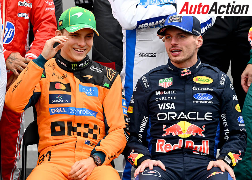Oscar Piastri in McLaren orange and Max Verstappen in Red Bull colours sit together during a Formula 1 drivers’ photo session.