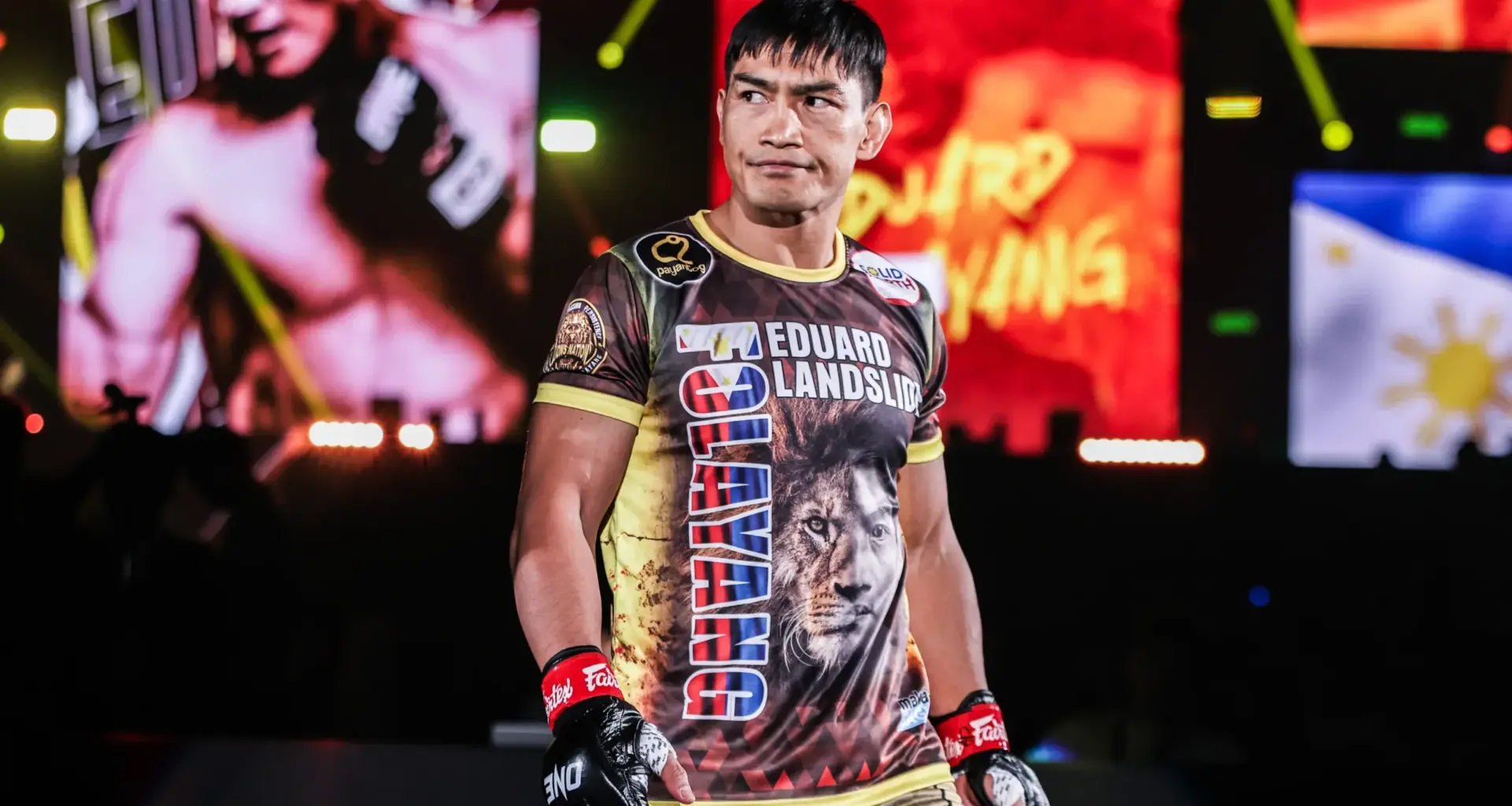 Filipino MMA fighter Joshua Pacio celebrates a win with his team