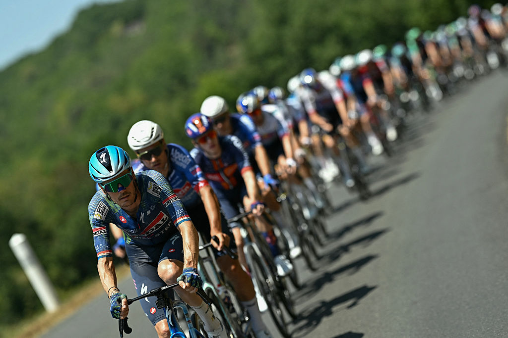 Soudal Quick-Step team's Dutch rider Dylan van Baarle leads the packs of riders (peloton) during the 8th stage of the 113th edition of the Tour de France cycling race, 180,4 km between Perigueux and Bergerac in southwestern France, on July 11, 2026. (Photo by Loic VENANCE / AFP)