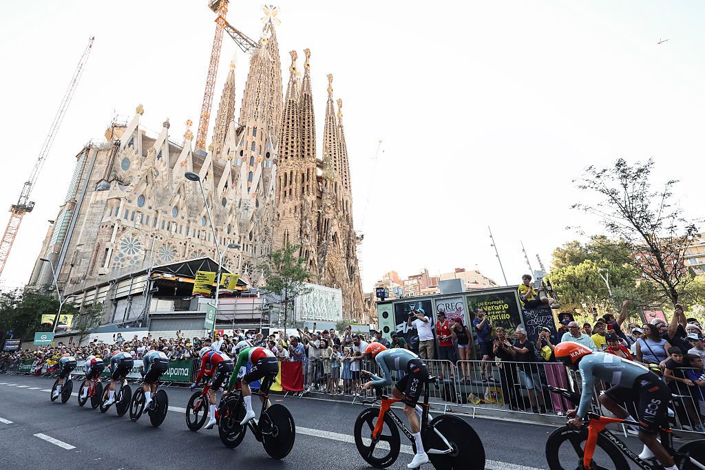 Netcompany Ineos race past the Sagrada Familia church during stage 1 of the 2026 Tour de France