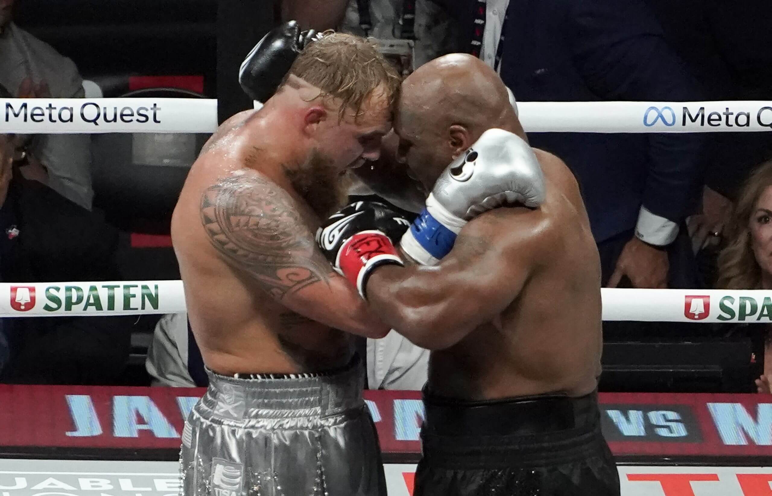 Jake Paul and Mike Tyson fight in the boxing ring