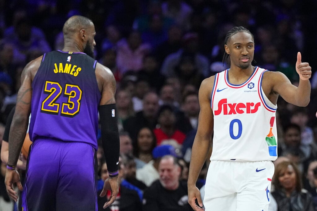 Tyrese Maxey #0 of the Philadelphia 76ers reacts in front of LeBron James #23 of the Los Angeles Lakers at the Wells Fargo Center on January 28, 2025 in Philadelphia, Pennsylvania.