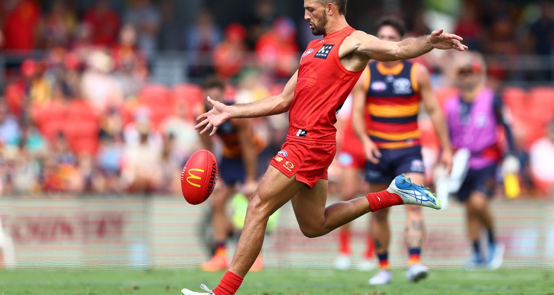 GOLD COAST, AUSTRALIA - APRIL 05: Ben Long of the Suns kicks a goal during the round four AFL match between Gold Coast Suns and Adelaide Crows at People First Stadium, on April 05, 2025, in Gold Coast, Australia. (Photo by Chris Hyde/Getty Images)