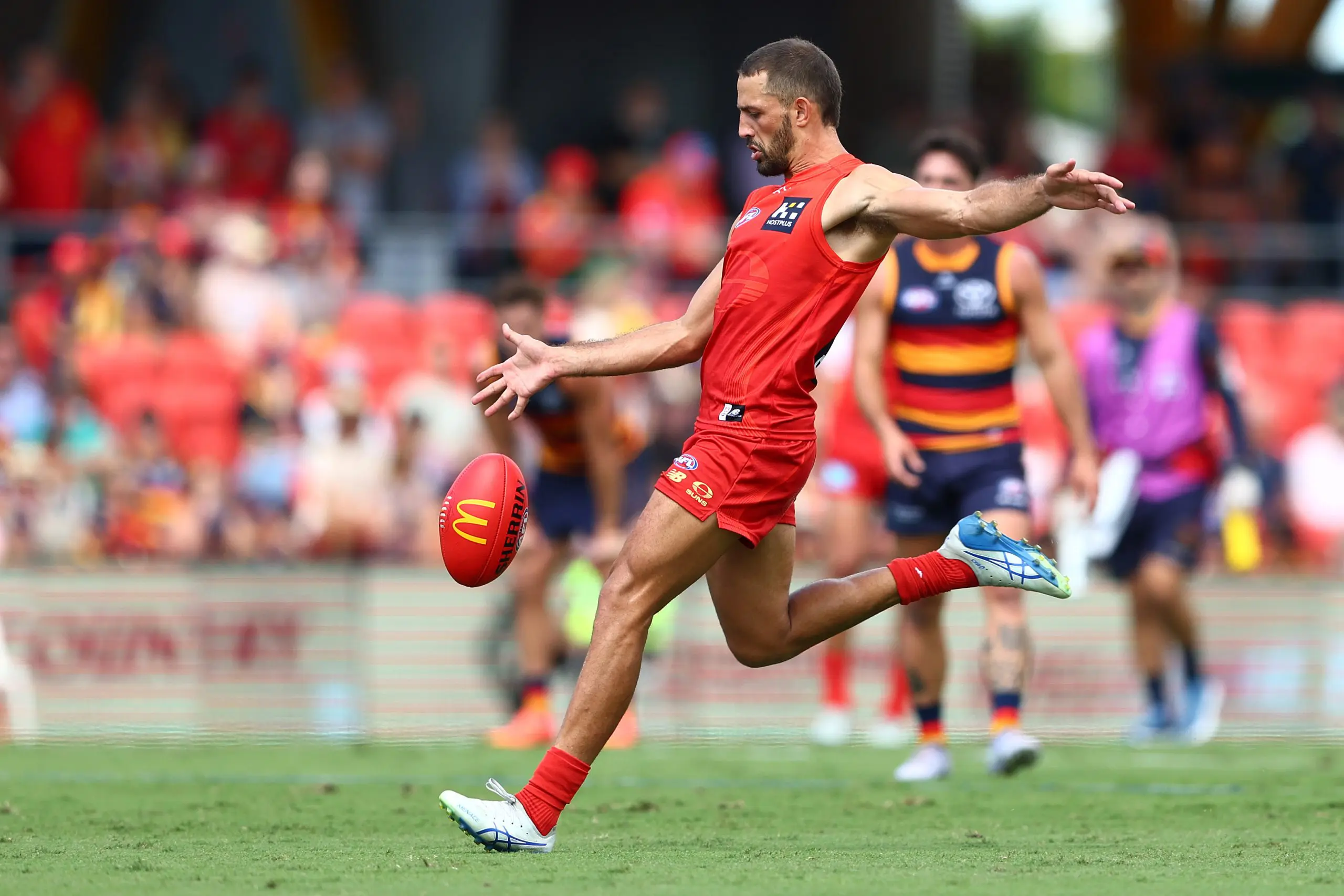 GOLD COAST, AUSTRALIA - APRIL 05: Ben Long of the Suns kicks a goal during the round four AFL match between Gold Coast Suns and Adelaide Crows at People First Stadium, on April 05, 2025, in Gold Coast, Australia. (Photo by Chris Hyde/Getty Images)