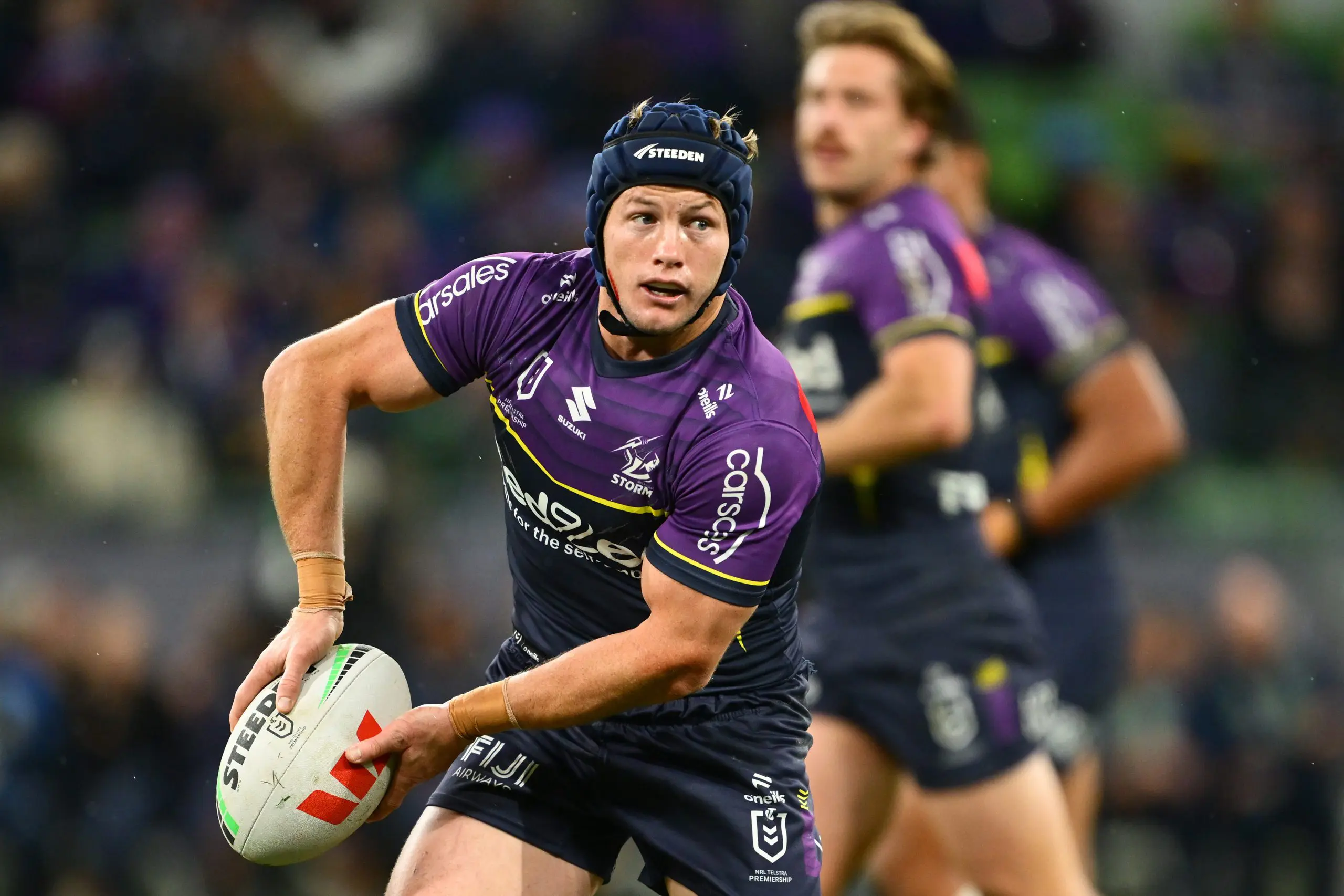 MELBOURNE, AUSTRALIA - JUNE 06: Harry Grant of the Storm passes the ball during the round 14 NRL match between Melbourne Storm and North Queensland Cowboys at AAMI Park, on June 06, 2025, in Melbourne, Australia. (Photo by Quinn Rooney/Getty Images)