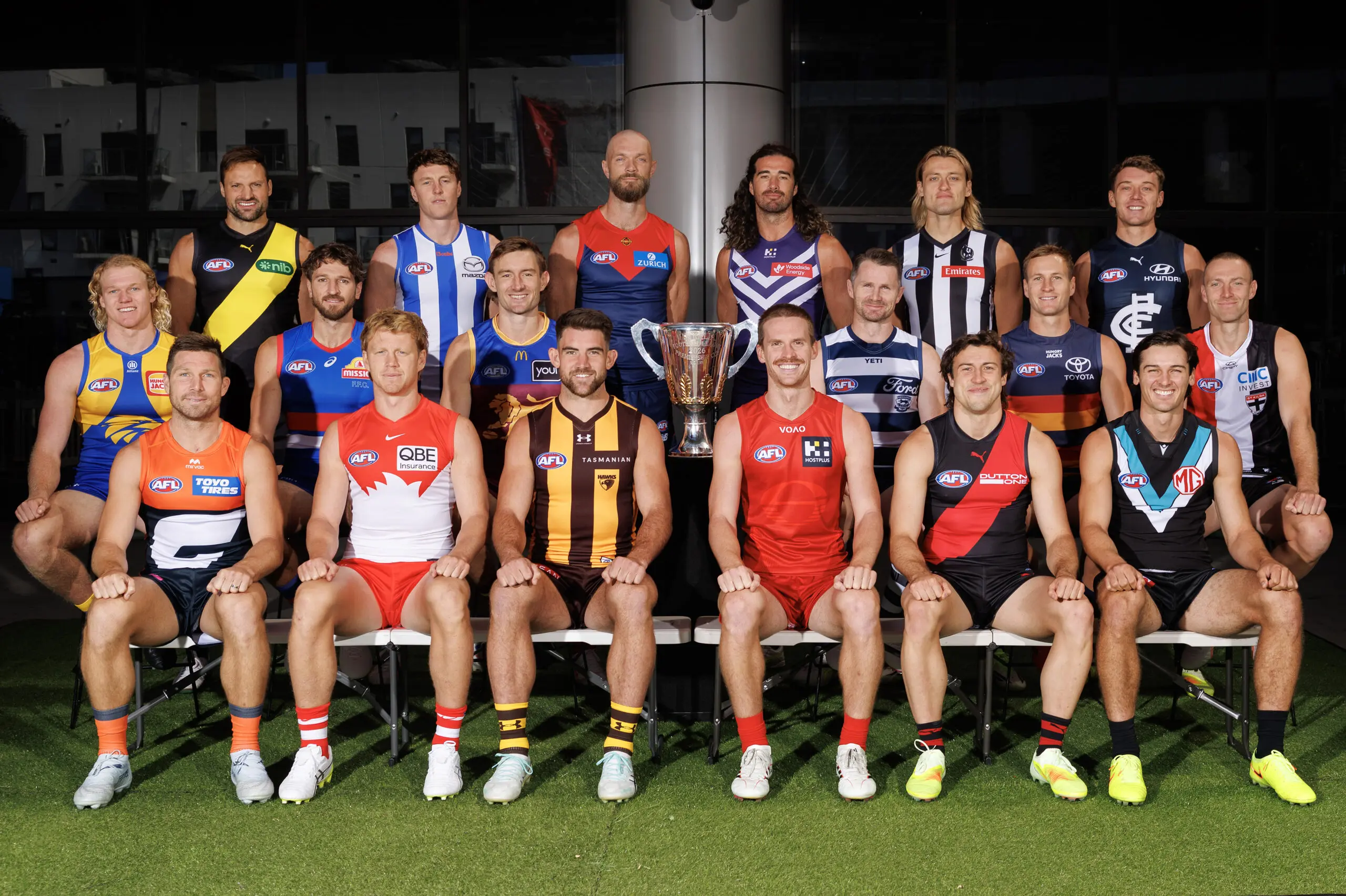 MELBOURNE, AUSTRALIA - FEBRUARY 23: AFL Club captains and representatives Toby Nankervis of the Tigers, Nick Larkey of the Kangaroos, Max Gawn of the Demons, Alex Pearce of the Dockers, Darcy Moore of the Magpies, Patrick Cripps of the Blues (Middle row L-R) Rueben Ginbey of the Eagles, Marcus Bontempelli of the Bulldogs, Harris Andrews of the Lions, Patrick Dangerfield of the Cats, Jordan Dawson of the Crows, Callum Wilkie of the Saints (Front row L-R) Toby Greene of the Giants, Callum Mills of the Swans, Jai Newcombe of the Hawks, Noah Anderson of the Suns, Andrew McGrath of the Bombers and Connor Rozee of the Power pose for a photograph during 2026 AFL Captain's Day at Marvel Stadium on February 23, 2026 in Melbourne, Australia. (Photo by Daniel Pockett/Getty Images)