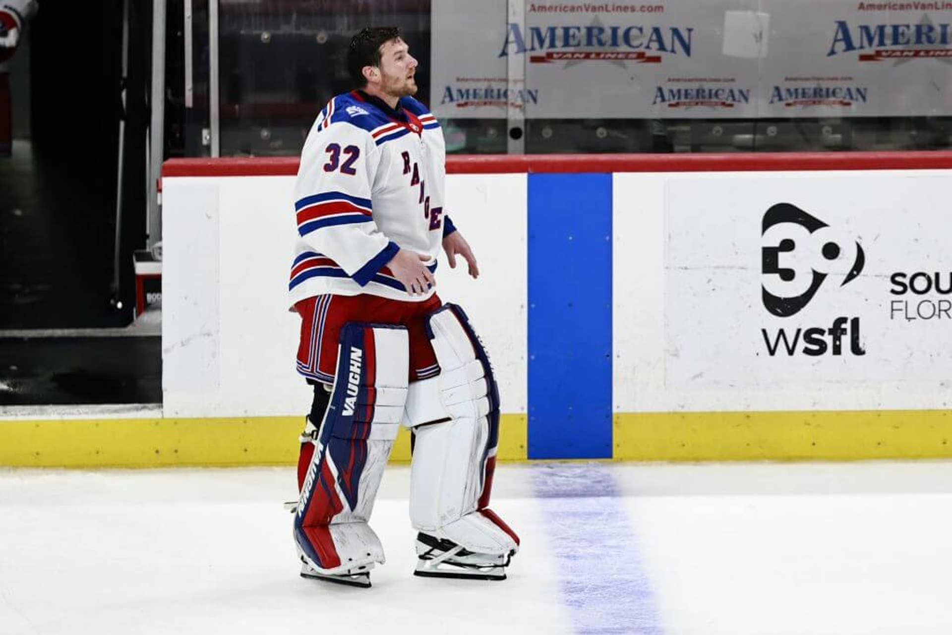 Wearing white New York Rangers gear, Jonathan Quick returns to the ice after his final NHL game in April 2026.