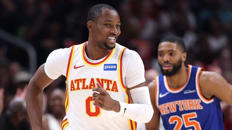 Atlanta Hawks forward Jonathan Kuminga runs up the court during an NBA game.