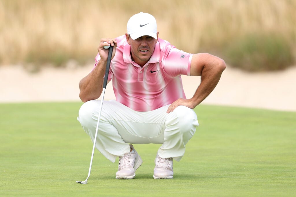 Brooks Koepka lines up a putt during the first round of the US Open
