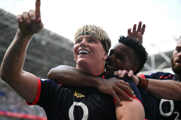 England's Henry Pollock (L) celebrates after scoring the team's tenth try during the Rugby Union Nations Championship match between Fiji and England at Hill Dickinson Stadium in Liverpool on July 11, 2026.